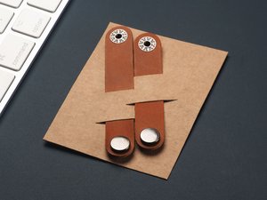 Nappikuulokkeiden organisaattori 2317141